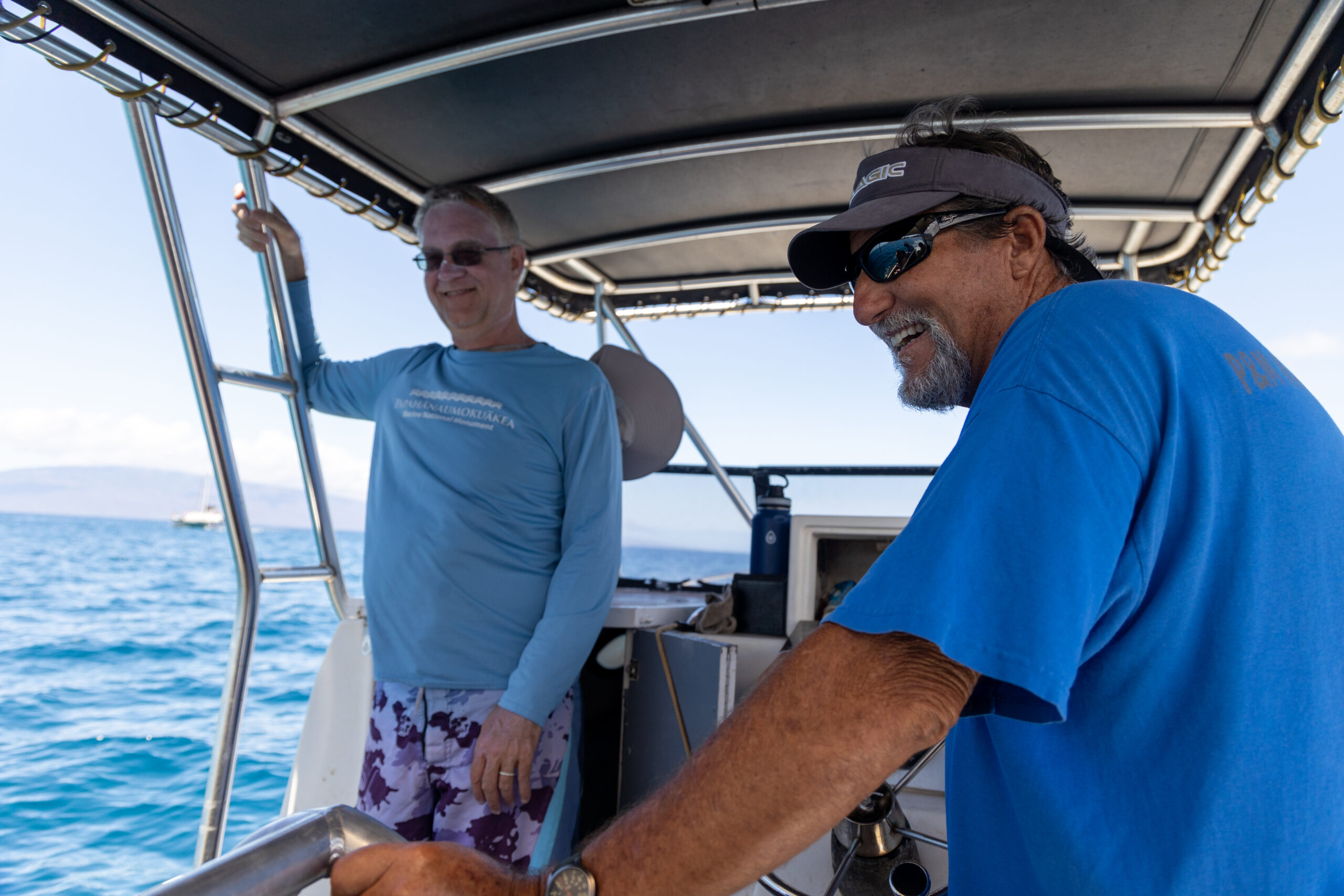 Marine researchers conduct coral reef monitoring on scuba in Maui, Hawaii